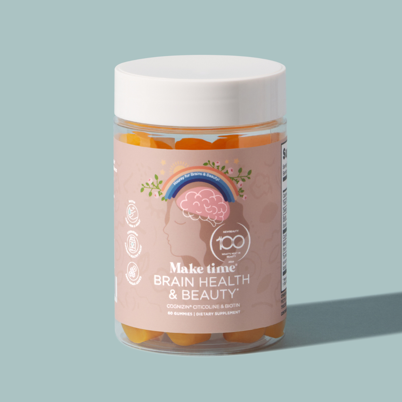 A bottle of Make Time for Brain Health & Beauty Gummies with a pink label, featuring an illustration of a brain and a clock, indicating the product is meant to support brain health and provide a boost for beauty.