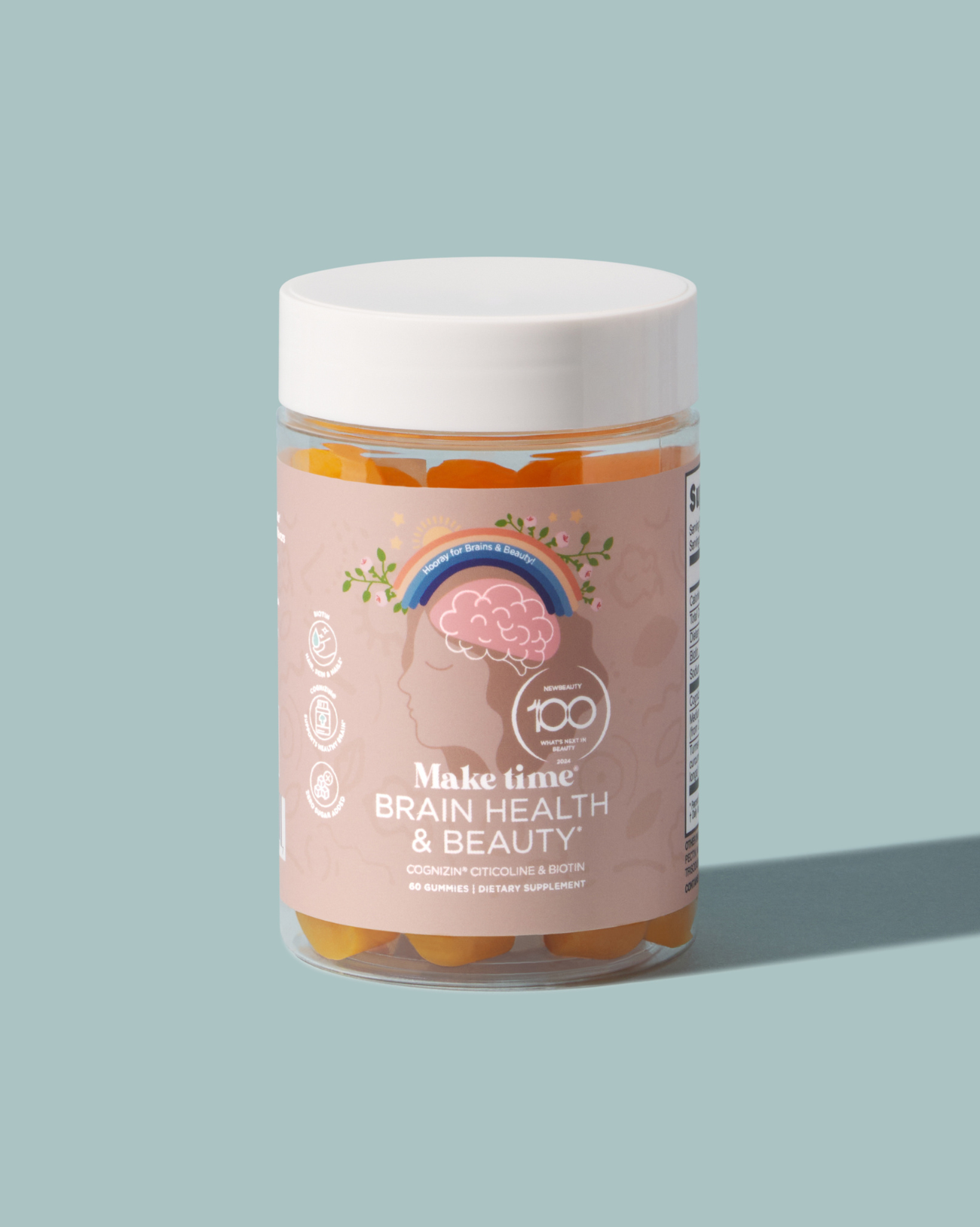 A bottle of Make Time for Brain Health & Beauty Gummies with a pink label, featuring an illustration of a brain and a clock, indicating the product is meant to support brain health and provide a boost for beauty.