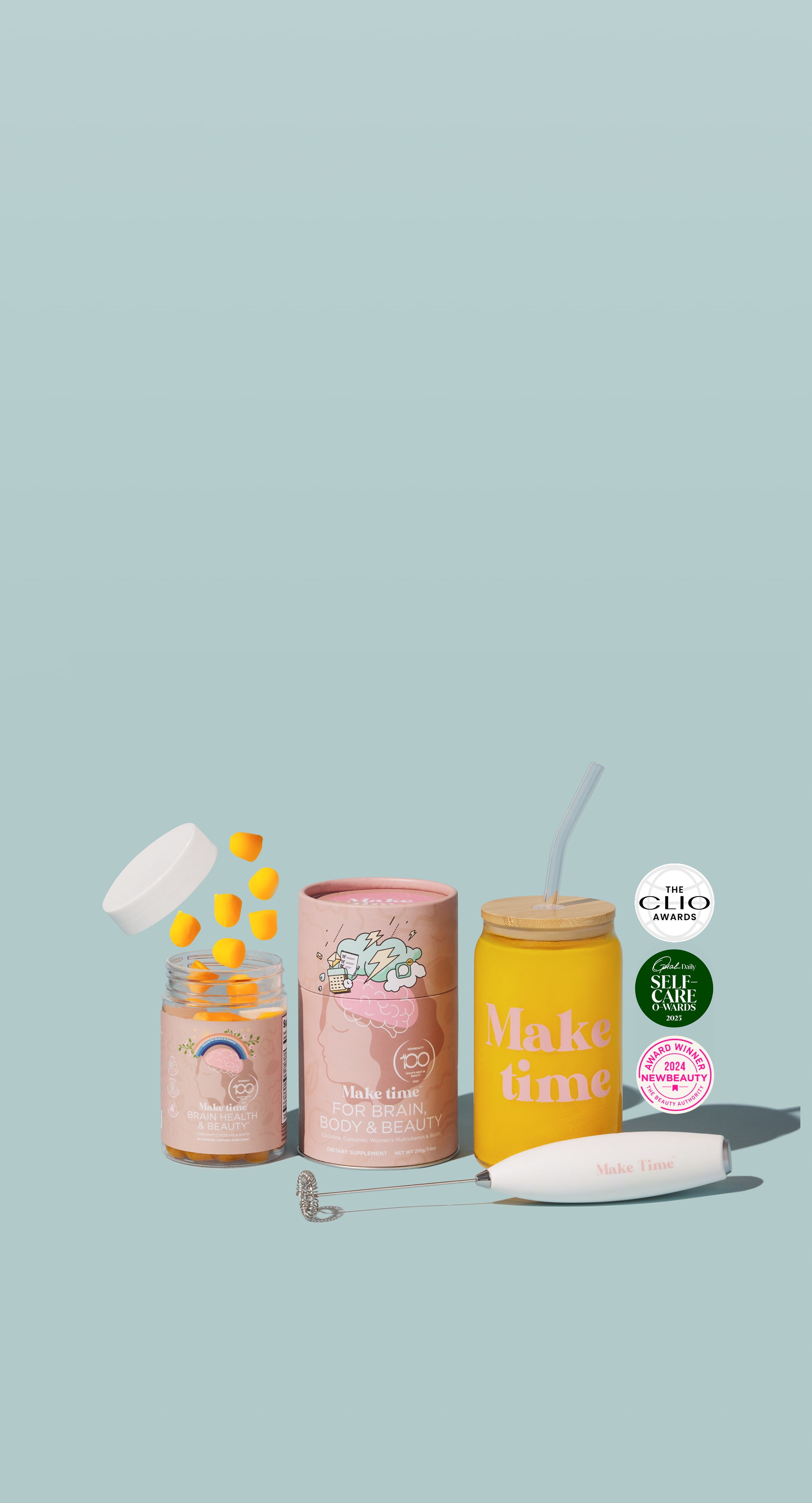 Set of Make Time Wellness products, The Brain Body and Beauty Powder, The daily supplement gummy, the glass cup with the BBB powder supplement drink, and the mixer all in front of a light blue background