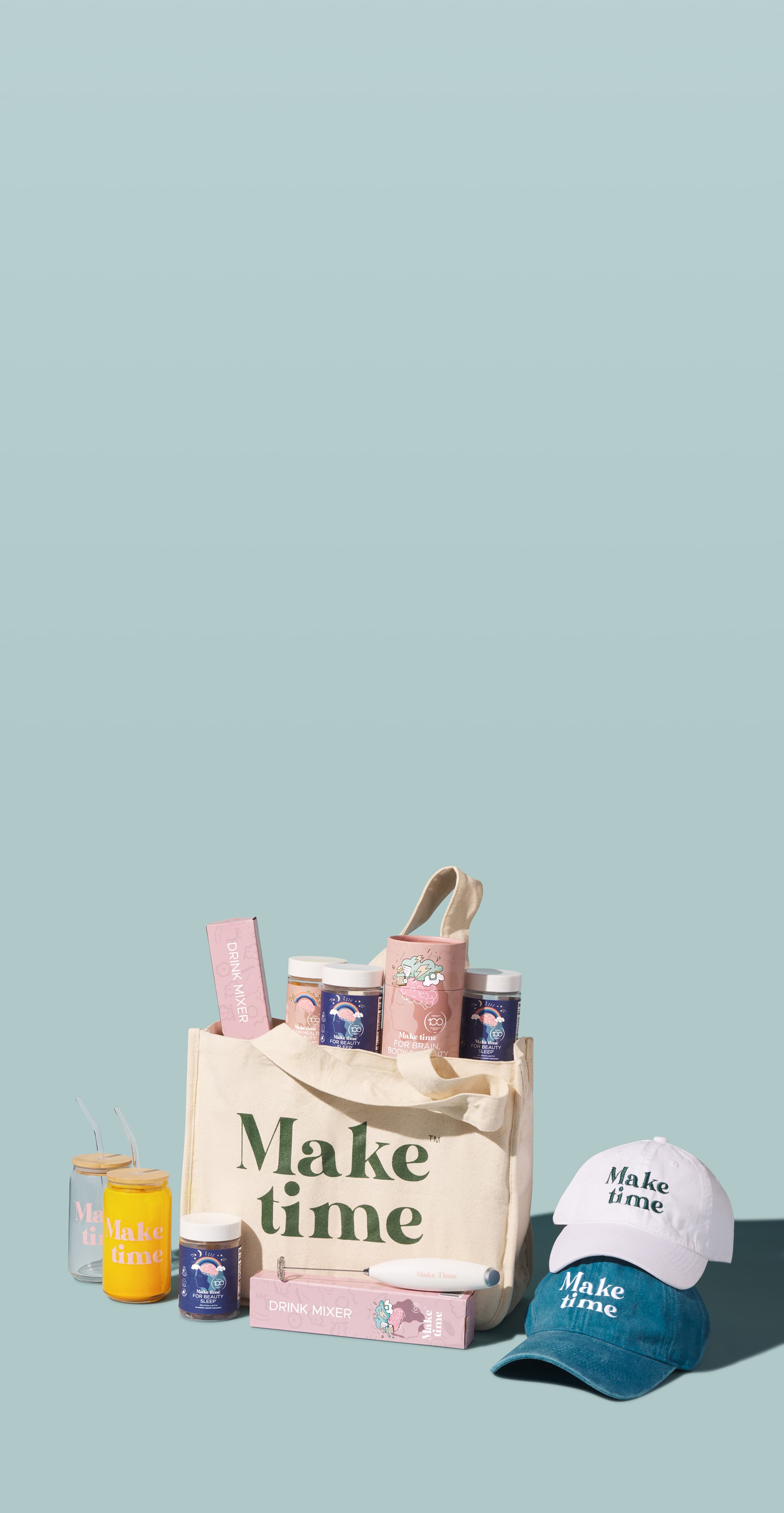 Product set with tote bag, cap, and bottles on a light blue background