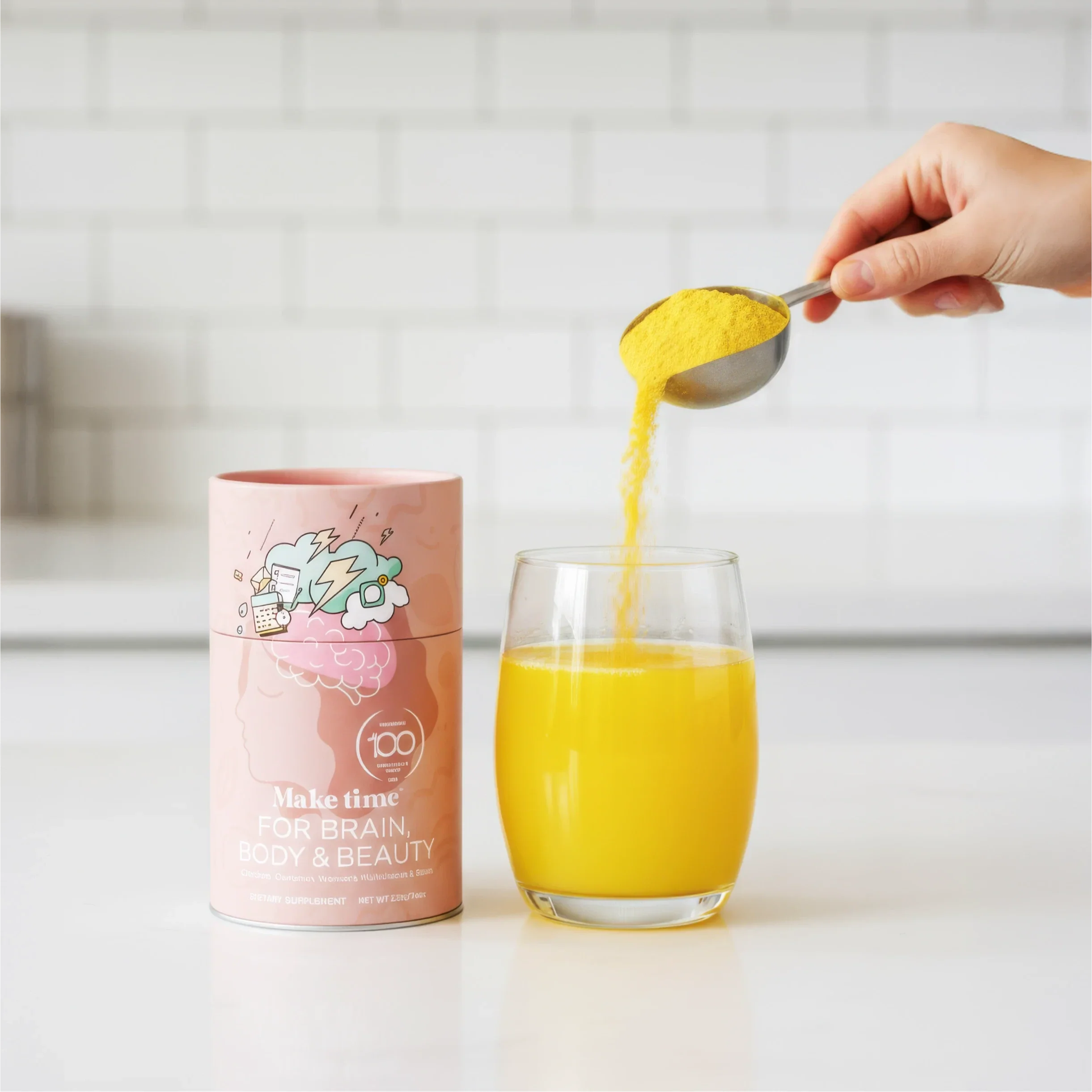 Make Time Brain, Body & Beauty powder being poured into a glass