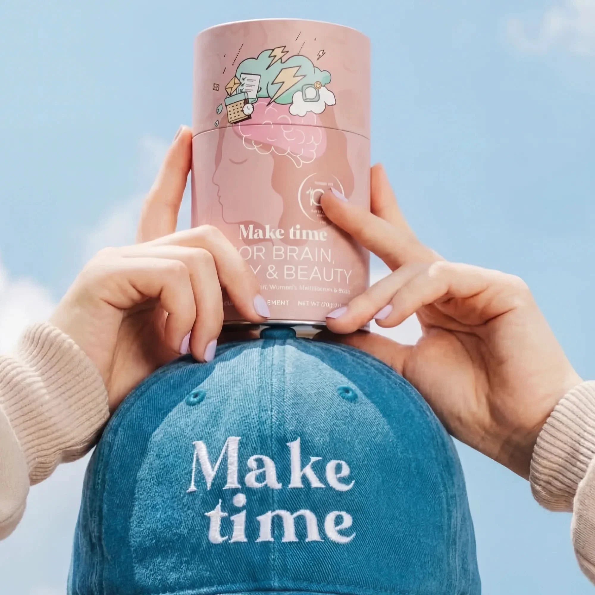 Woman holding a Make Time Brain, Body & Beauty powder canister